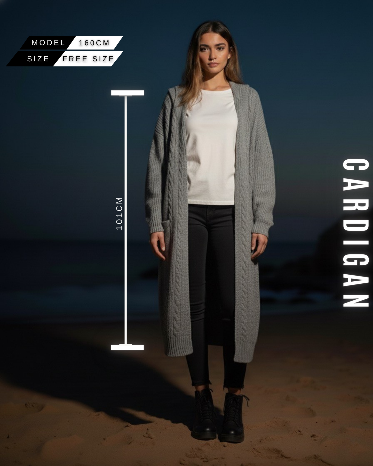 Eine Frau trägt einen langen, grauen Strick-Cardigan mit Zopfmuster und Kapuze (Länge 101 cm)