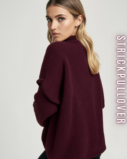 Rückansicht einer Frau, die einen burgunderroten Strickpullover trägt, der eine lockere Passform hat.