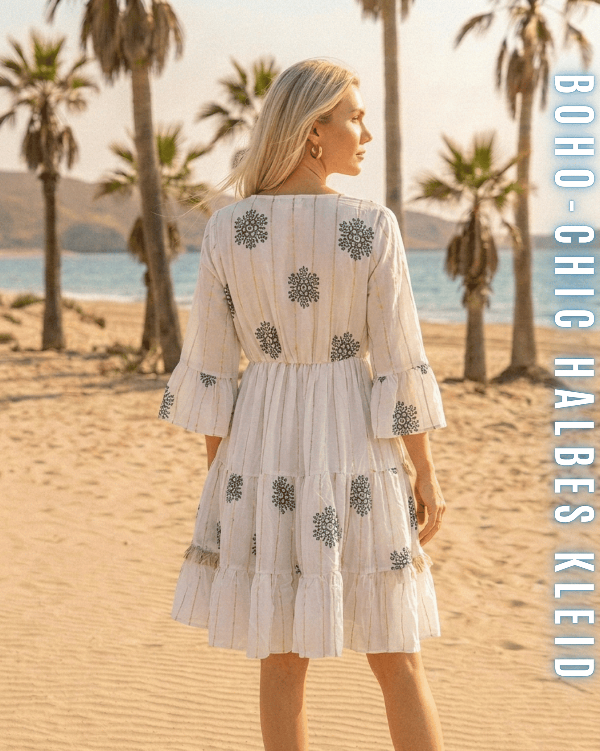 Rückansicht eines weißen Kurz-Kleides mit floralen Stick-Elementen.