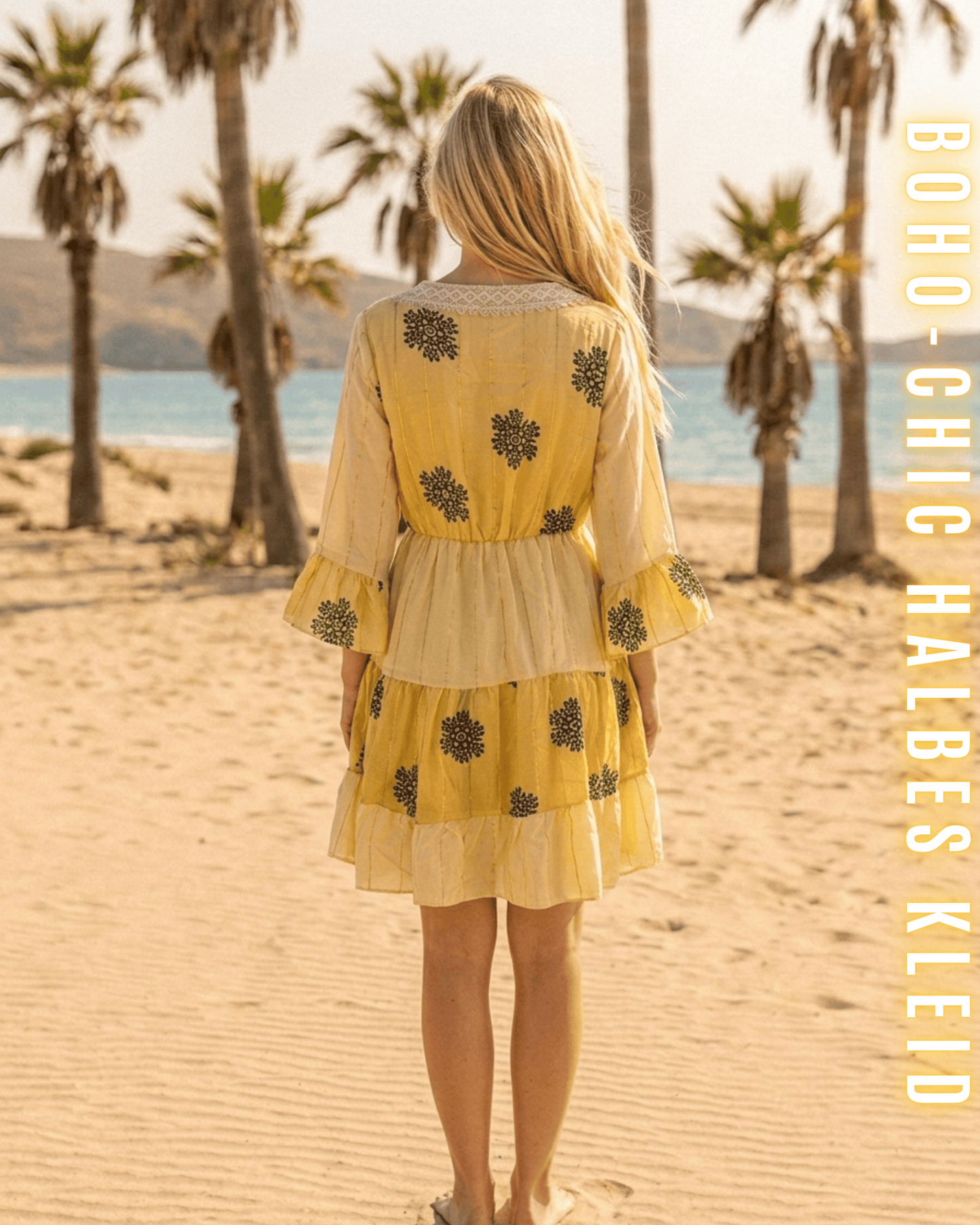Rückansicht eines gelben Kurz-Kleides mit floralen Stick-Elementen.